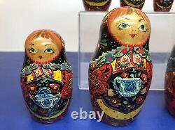 75-7 Vintage Artist Made Russian Nesting Counting Doll 9 Piece Hand painted R