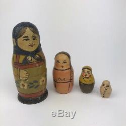 Antique Handpainted Russian Nesting Matryoshka doll (Babushka) with baby