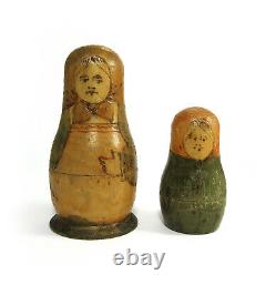 Antique Russian matryoshka. Two figures. Old nesting doll