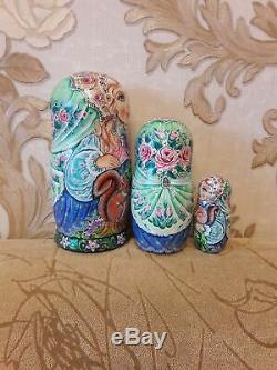 Author's russian matryoshka Girls with squirrels