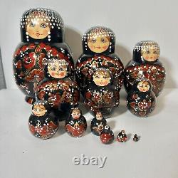 Nesting Dolls Matryoshka Wood Black w Red & Gold Flowers 12 Pieces