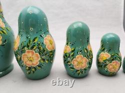 Russian 7 Piece Nesting Matryoshka Dolls Gold Foil Hand Painted Buildings Floral