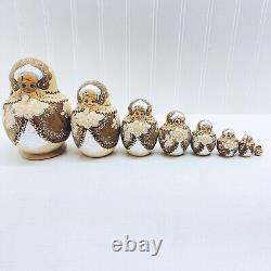 Russian Hand Painted Matrjoska Nesting Dolls 8 Pieces Gold Brown Signed