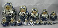 Russian Matryoshka blue and gold stacking dolls signed nest of 19 dolls 20 cm