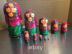 Russian nesting dolls hand painted with gold leaf, signed by artist